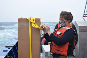 Research Specialist Heather Furey prepares an Argo float