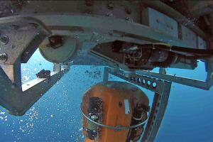 ROV Jason carrying equipment for placement on ocean bottom
