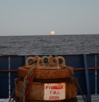 Setting full moon over the Atlantic