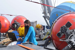 Engineer Jennifer Batryn reconfigures one of the zooplankton sensors