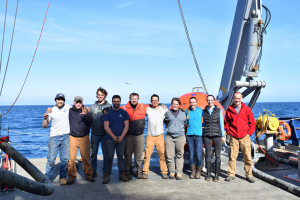 The OOI and OSNAP science team poses on the back deck of the R/V Neil Armstrong