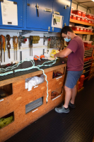 Nico Llanos splices the nylon and Colmega lines together, in preparation for the OOI surface mooring deployment