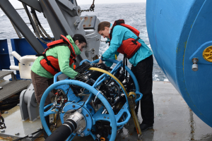Stephanie Petillo and Jennifer Batryn prepare the Near Surface Instrument Frame