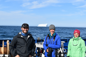 Irminger 8 team in front of iceberg