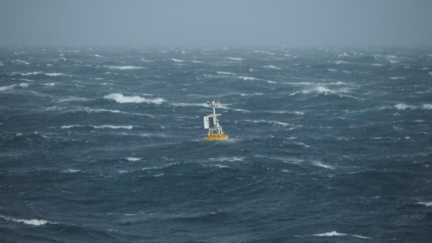 The Argentine Basin Surface Mooring buoy bobs with the waves after being deployed in over 3 miles of water (5.2km). (Photo Credit: OOI Coastal Global Scale Nodes program Argentine Basin deployment team)