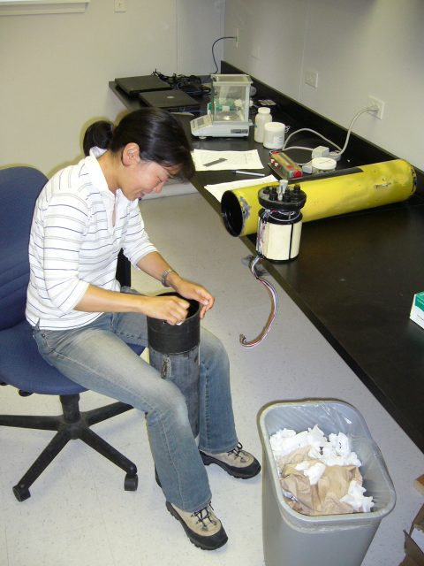 Maintenance of acoustic instrument during her MS program in University of Maine (Darling Marine Center). Credit: Mei Sato
