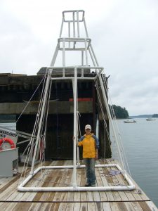 Frame to deploy hydroacoustics underwater, made of PVC pipes, at the dock of Darling Marine Center. Credit: Mei Sato
