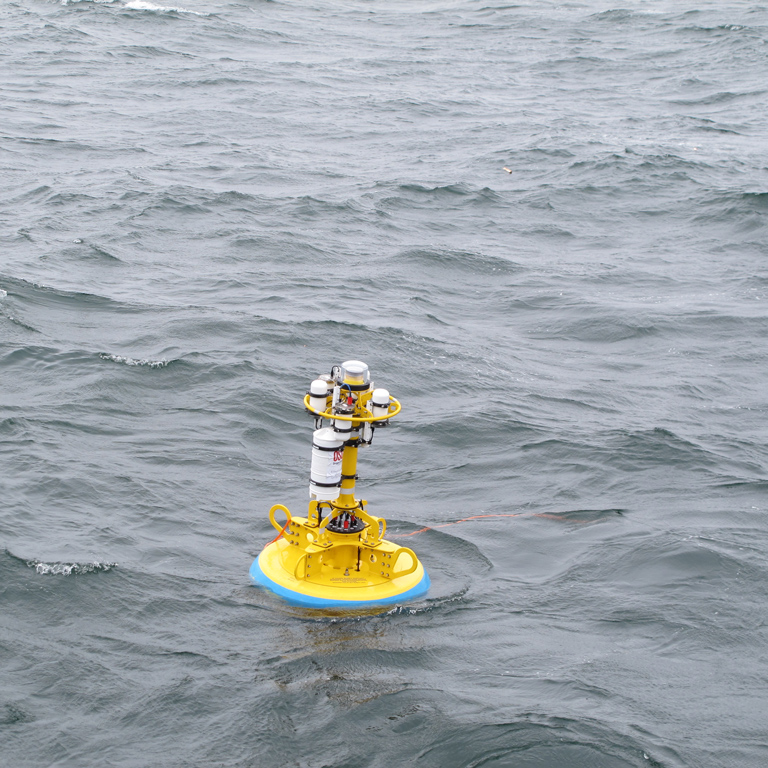 The Endurance Array Oregon Inshore Surface Mooring deployed in 25m of water off the coast of Newport, OR. The mooring consists of the buoy, an instrument frame 5m below the buoy, and a multi-function node at the seafloor, which together carry 19 oceanographic instruments that transmit near real-time data to shore. (Photo Credit: Tom Kearney, Oregon State University)