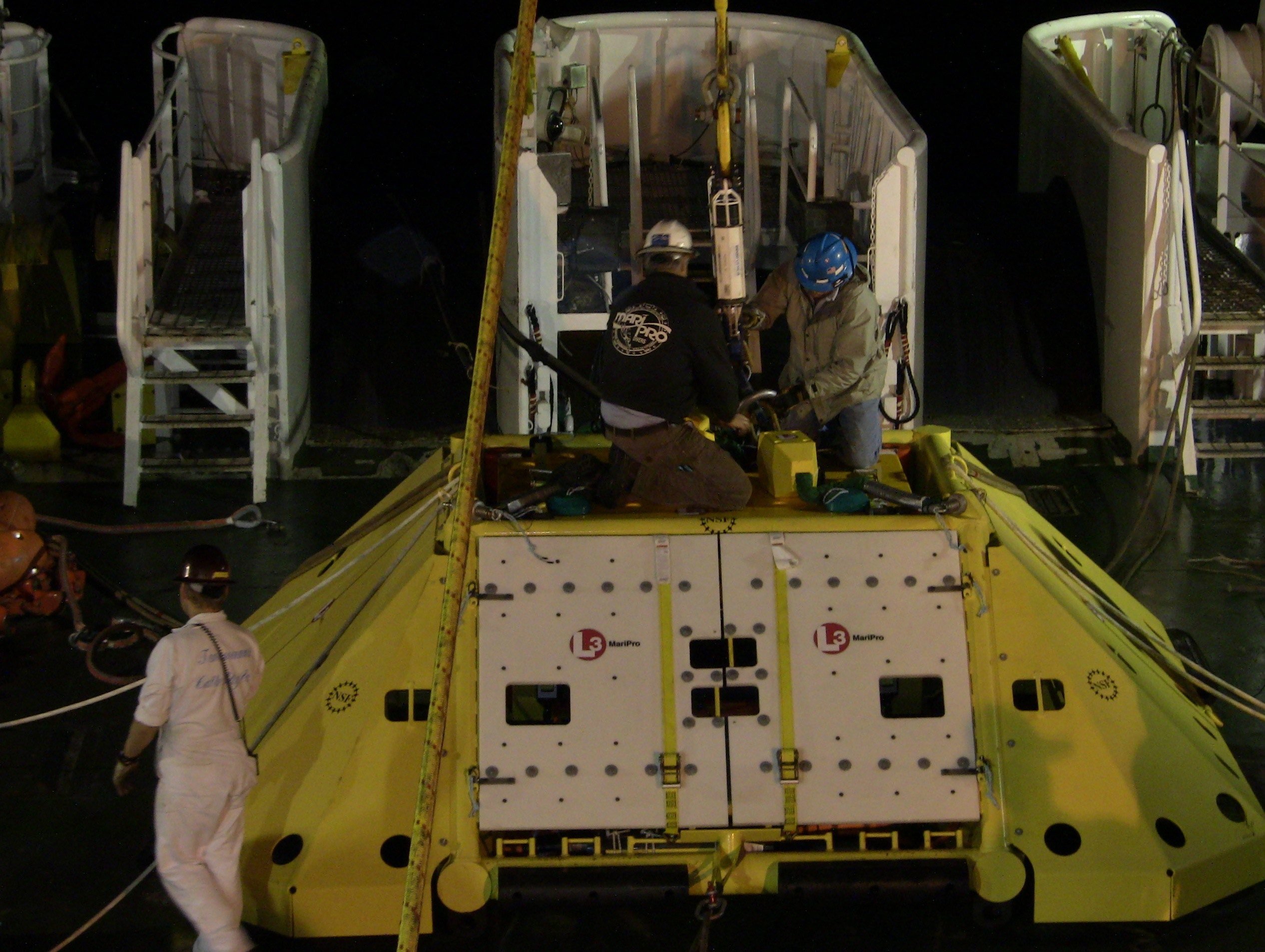 Node installation operations went on around the clock. Shown here is Primary Node 1B (PN1B) being readied for a nighttime deployment. Operations for deployment of this node began late in the evening of July 19. Just before midnight it was confirmed that the node had landed on the seabed at about 1,250m water depth and only 20m away from its target location. Photo by Cecile Durand 